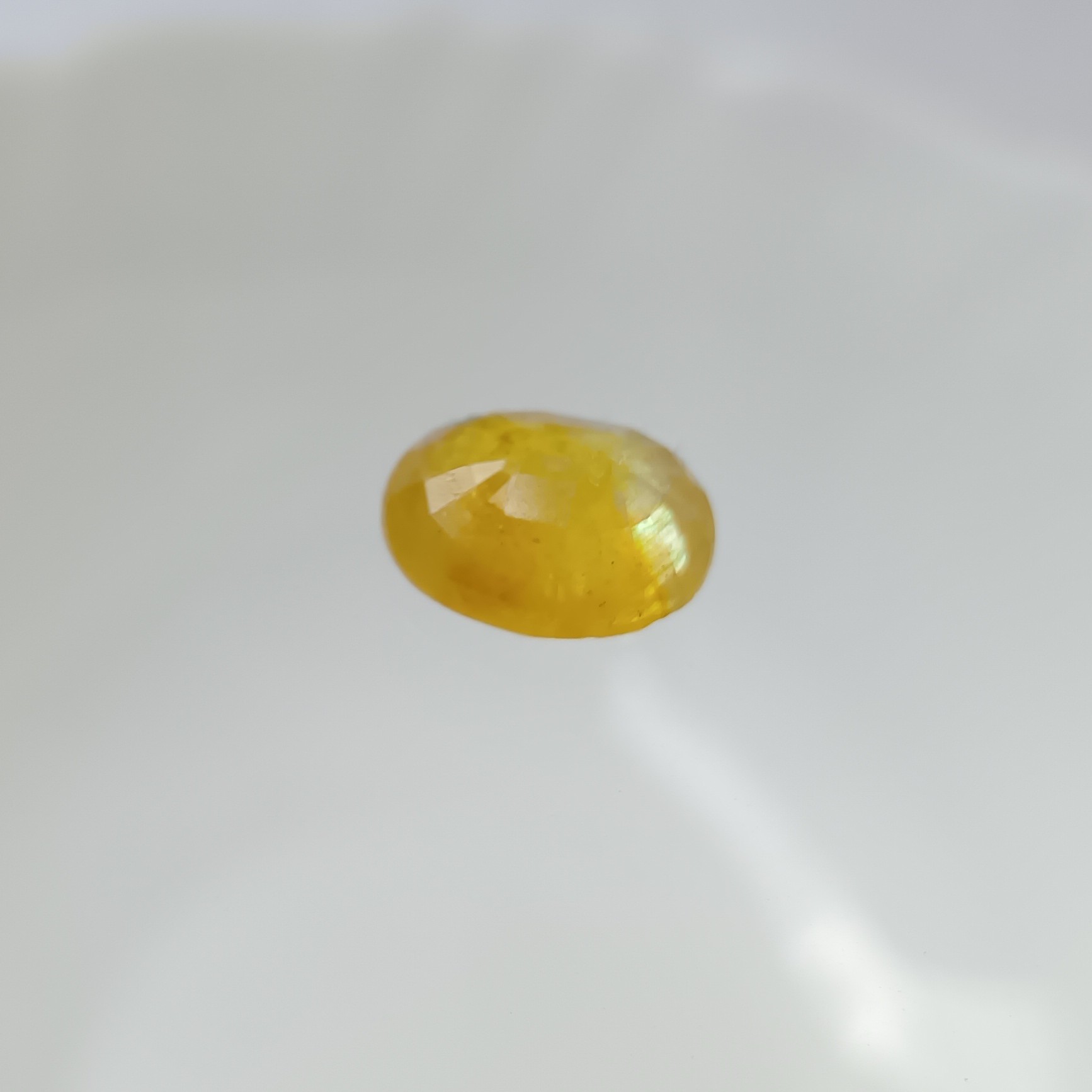 Macro Inspection of Untreated Yellow Sapphire Natural Silk Inclusions