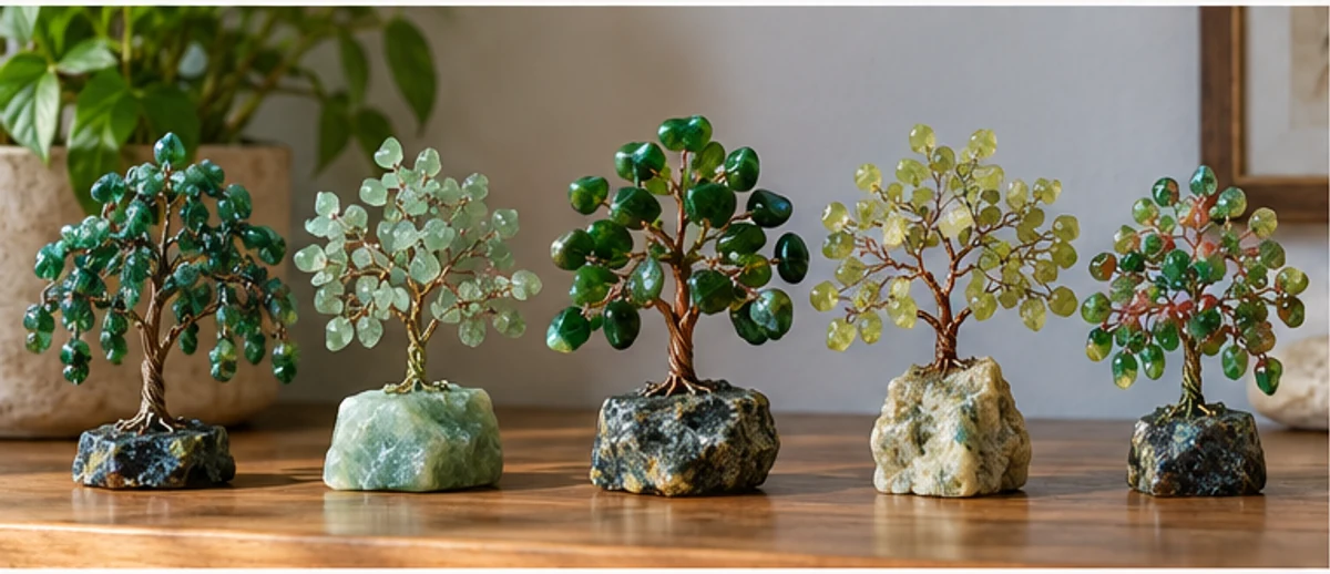 A collection of five different green gemstone tree designs